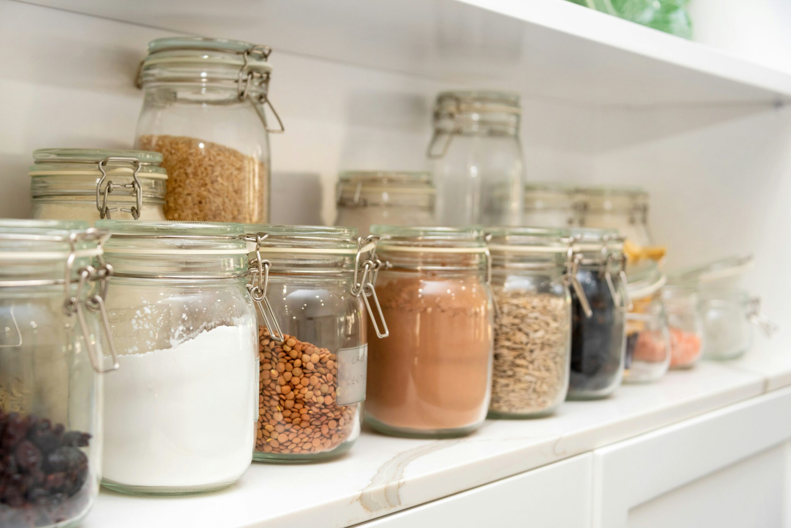 pantry with jars of food on a shelf